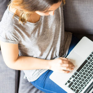young woman with laptop computer